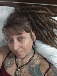 I like the "Riley" photo for the top banner here