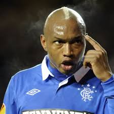 Neil Warnock signs 'sewer rat' El Hadji Diouf