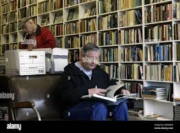 Royce Moore, front, of Decatur, Texas, and Orrin Stevens, back, of Dallas,  browse through books at Booked Up Inc., store number four, owned by author  Larry McMurtry, in Archer City, Texas, Saturday,