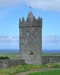 The castle is a round tower house with a small courtyard enclosed by a defensive wall. Ancient To Medieval And Slightly Later History Doonagore Castle County Clare Ireland Doonagore