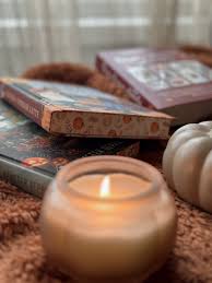 🎃 📚 . . . . . . . . . . . . . . . . cozy autumn, pumpkin season, fall  aesthetic, cozy home, books and candles, autumn reading, candlelight,