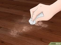 Cover the burned area with baking soda. 3 Simple Ways To Remove Burn Marks On Wood Wikihow
