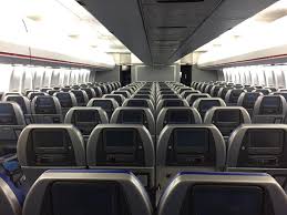 Updates the stock 747 interior from ugly brown to a light blue. New Dunsfold Boeing 747 Economy Interior