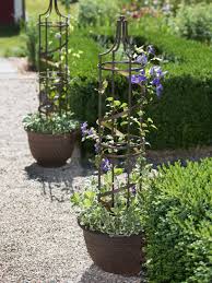 This plant garden obelisk has a detailed spiral finial. Pin By Bini Wibi On Garten In 2021 Trellis Plants Obelisk Trellis Pot Trellis