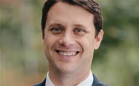 A smile that crosses generations: Grandson of Jimmy Carter runs for  governor of Georgia