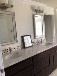 Not only has color—from black to blue, gray, and green—come back into the kitchen in a big way, but so have wood finishes. Two Tone Cabinets In Your Kitchen Transitional Bathroom Seattle By Swi Home Pros Wa Houzz