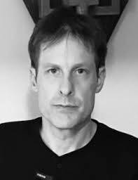 About Christopher Reed Johnson, the New Head