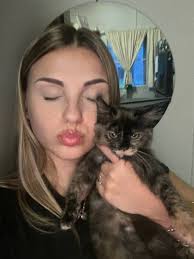 can someone restore this photo of my late wife with our grand daughter  please in a nice back ground if possible thank you