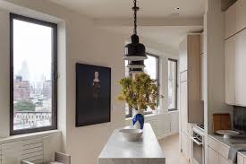 How Do You Renovate A Triangle Shaped Apartment In 2020 Custom Side Tables Vintage Table Lamp Chair Design