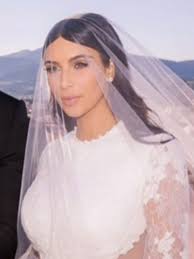 No one has seen my dress! Aw Kim Kardashian Poses With Kanye West And Baby North On Wedding Day While Khloe Shares Family Bridesmaid Photo Celebsnow