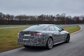 Bmw made a number of big announcements on wednesday. New Bmw I4 Ev S Benchmark Handling Detailed In New Video Autocar