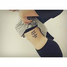 As someone with 10 of them can attest, the images and words we choose to permanently etch onto our bodies are often carefully chosen and thought out. Side Tattoo Saying Keep Calm And Carry On