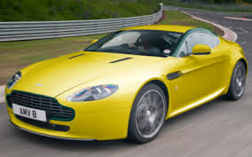 Image result for Sunburst Yellow 2012 Aston Martin