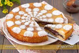 Pasticcini al cocco e nutella, dei dolcetti al cocco golosi preparati con solo 4 ingredienti, senza burro, senza farina, senza tuorli d'uovo e senza lievito dolci con farina di cocco, ricette facili e golose da fare anche senza forno come le deliziose palline pronte in 10 minuti oppure le torte con cuore di. Torta Versata Al Cocco E Nutella