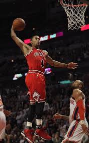 Chicago Il March 12 Derrick Rose 1 Of The Chicago Bulls Goes Up For A Dunk Over Tyson Chandler Chicago Sports Teams Chicago Bulls Basketball Chicago Bulls