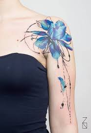 Abstract Style Blue Lotus Flower Tattoo On The Left Shoulder Cool Shoulder Tattoos Flower Tattoo Shoulder Shoulder Tattoos For Women