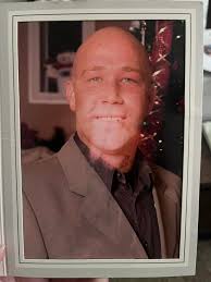 Remove water damage from deceased father's photo?