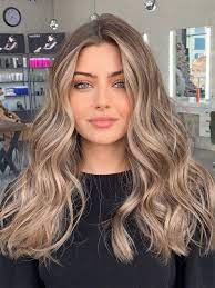 Choosing the right hair color for your skin tone. Best Hair Colours To Look Younger Glam Blonde With Waves