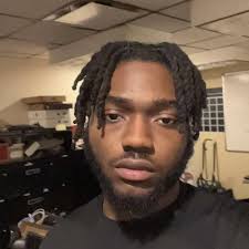 Somuadina Uwaezuoke of Park Forest Honored at Lewis University's  President's 15th Annual Art Exhibition