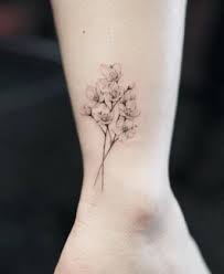 White Cherry Blossoms On Ankle By Nando Back Tattoo Blossom Tattoo Ankle Tattoos For Women
