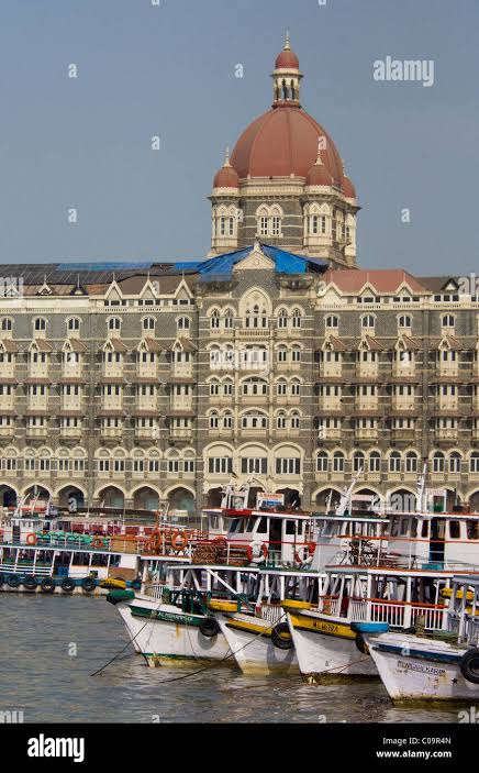 India, state of Maharashtra, Mumbai (aka Bombay). Waterfront area of Mumbai with typical local boats & the historic Taj Hotel Stock Photo - Alamy