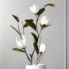 This beautiful faux flower arrangement features a white magnolia flower that looks good all year long. Shop Faux Magnolia Stem Hand Applied Flower Petals And Leaves Sprout Naturally From Sturdy Faux Magnolia Stem Tall B Faux Plants Faux Olive Tree Floor Plants