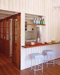 17 Kitchen Serving Hatch Ideas Hand made sturdy shelf fir a serving beer matt shelf with another draw underneath cabinet for drinks to be stored 3 glass shelves in the top half.