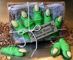 For this classic party activity, you'll need a poster or picture of donkey, construction paper and blindfold. Kids Shrek Party Favors Ogre Toes Are Almond Shortbread Etsy Shrek Halloween Party Kids Fun Cookies