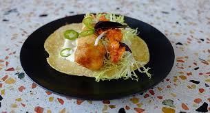 Once the oil has a slight ripple look, carefully place the halibut in the oil. Why Everybody S Talkin Bout Tacos San Diego Reader