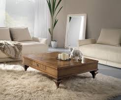 Another coffee table with a plinthlike base that feels just a tad lighter than the one above. Classic Wooden Coffee Table Idfdesign