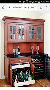 The liquor cabinet also carries a wide range of the finest spirits like rum, tequila, and whiskey. Pin By Amy Holt On Liquor Cabinet Bars For Home Kitchen Bar Bar Furniture