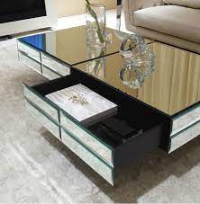 The center table in your living room does a lot of jobs. Modern Center Tables For Your Living Room Top 10 Choices