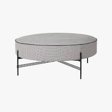 Ottomans and poufs are great leg rests and floor seats in the living room or basement. Contemporary Ts Pouf By Gubi South Hill Home