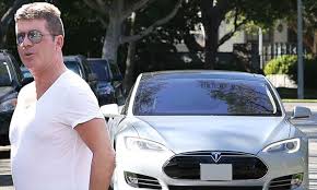 Simon Cowell With His Tesla Model S For More Check Out Www Evannex Com Tesla Model S Elon Musk Tesla Tesla Car