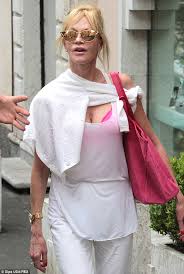Looking to the fuchsia: Melanie Griffith co-ordinates hot pink ...