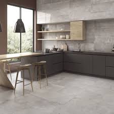 These tiles really set off other elements within the kitchen space and work beautifully with wooden furniture. Infinity Dark Grey Wall Tile Tileflair