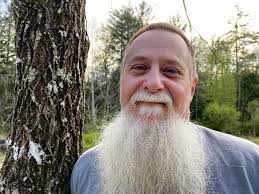 Modified Dixon zero turn mower with power dump bed for yard cleanup