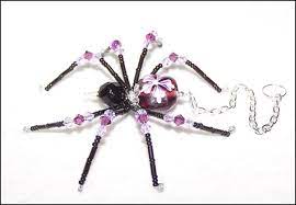 Check spelling or type a new query. Rhea Purple And Violet Glass Beaded Spider Goth Sun Catcher Etsy Beaded Spiders Glass Beads Wire Wrapped Jewelry