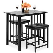 Simple yet elegant table with long legs and 2 padded counter height stools creates a compact but functional kitchen set. Best Choice Products 3 Piece Counter Height Dining Table Set W 2 Faux Leather Stools Space Saving Design Black Target