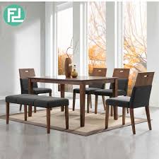 It measures 48 in diameter, so you can seat six comfortably. Roman 6 Seater Solid Wood Dining Set With Bench Walnut Furnituredirect Com My