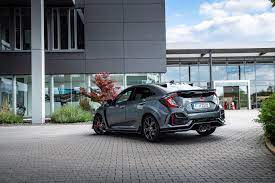 You'll recognize it by its body color grille accents, a bigger grille opening and a little less mesh over some of the fake vents. 2020 Honda Civic Type R