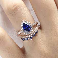 Pear Sapphire Halo Bridal Ring Set By La More Design Sapphire Wedding Rings Sapphire Engagement Ring Set Saphire Wedding Ring