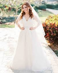 The Best Hairstyles For Every Wedding Dress Neckline Martha Stewart Weddings When Your Curls A Necklines For Dresses Wedding Dress Necklines Hairdo Wedding