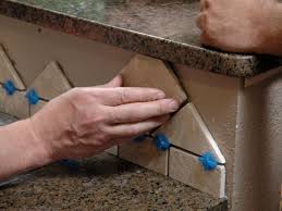 Every now and then, you'll run into a tight spot that a trowel refuses to fit into. How To Install A Backsplash In A Kitchen How Tos Diy