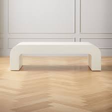 Horseshoe Ivory Lacquered Linen Rectangular Coffee Table Reviews Cb2 It's only job is to hold our lamp, our wifi modem and a the look great with our white stain hemnes cabinets.