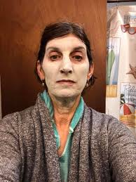 I just got this guy. The mask is in the chest plate right? How does it come  out.?