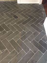 If i look at my entry at an angle, i can see the sides of the black porcelin tile and it looks like dark grout, so i think i will go darker than the tile (maybe a charcoal?). Tumbled Brazilian Black Slate 4x12 With Mapei Pearl Gray Grout Grey Grout Slate Flooring Green Kitchen