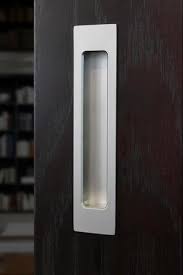 Once you decide how secure you need your pocket door to be, then choose from our multitude of shapes and styles on handlesets.com. Halliday Baillie Modern Pocket Door Hardware That Doesn T Suck Better Building Hardware
