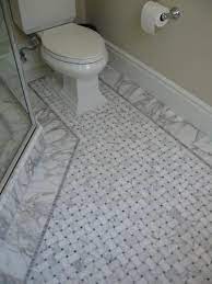 See how top designers create both timeless and trendy looks with marble, cement, ceramic, porcelain, faux wood and glass tile. Mosaic Tile Bathroom Floor Mosaic Flooring Bathroom Flooring