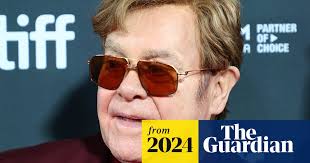 Elton John makes first appearance after revealing 'limited vision'